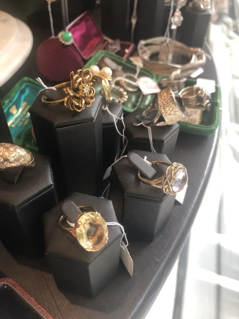 Display of vintage gold rings at Uuli's antique shop in Manly